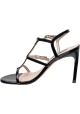 Stuart Weitzman Women's high heel sandals in black patent leather with double buckle